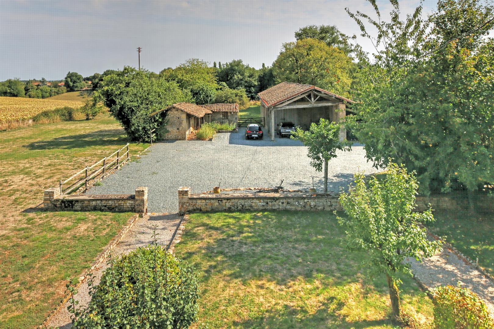 Beautiful Maison de Maître offering 5 beds/5baths, 4 reception rooms, heated pool and 1.3 hectares of land.