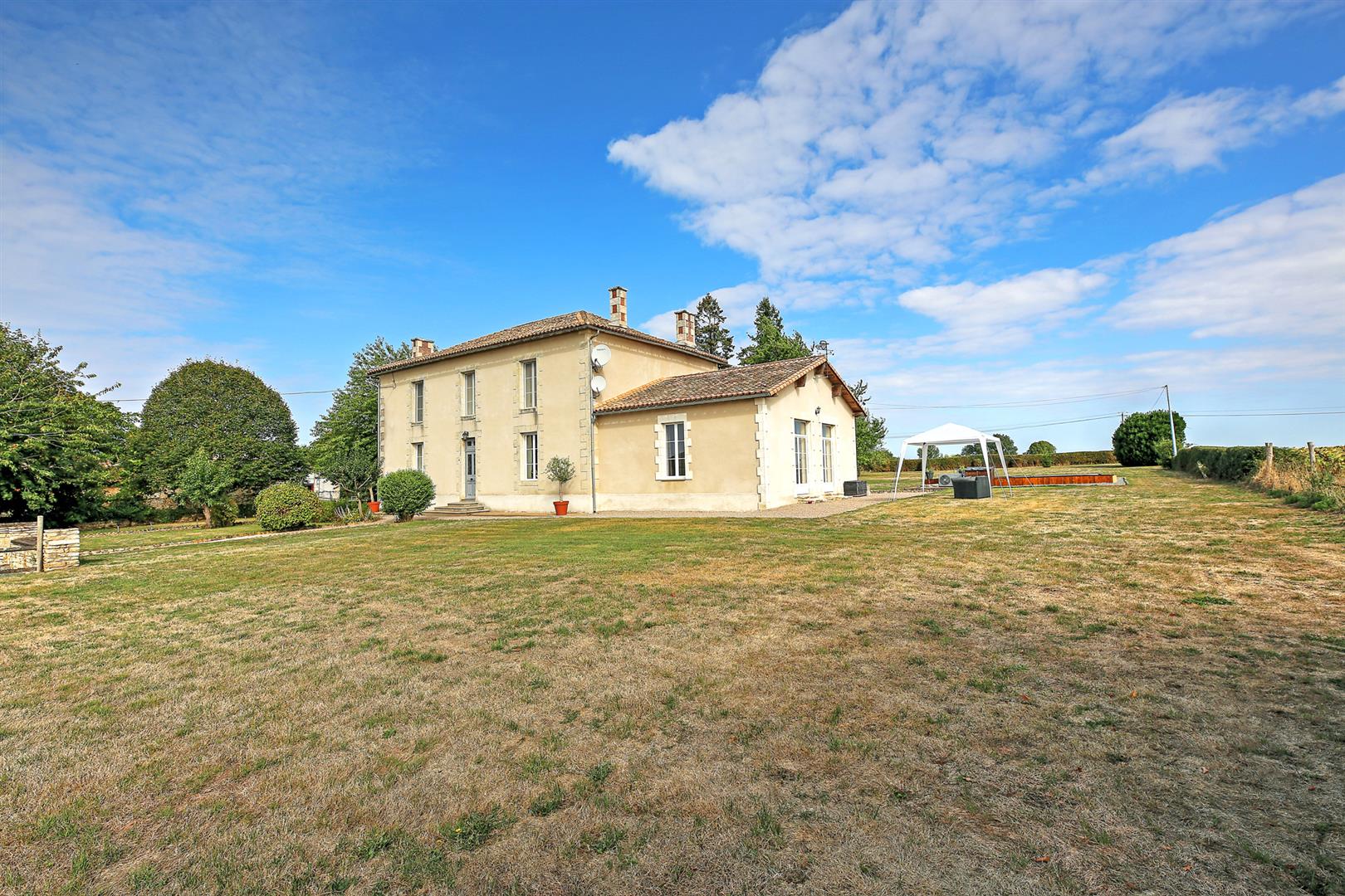 Beautiful Maison de Maître offering 5 beds/5baths, 4 reception rooms, heated pool and 1.3 hectares of land.