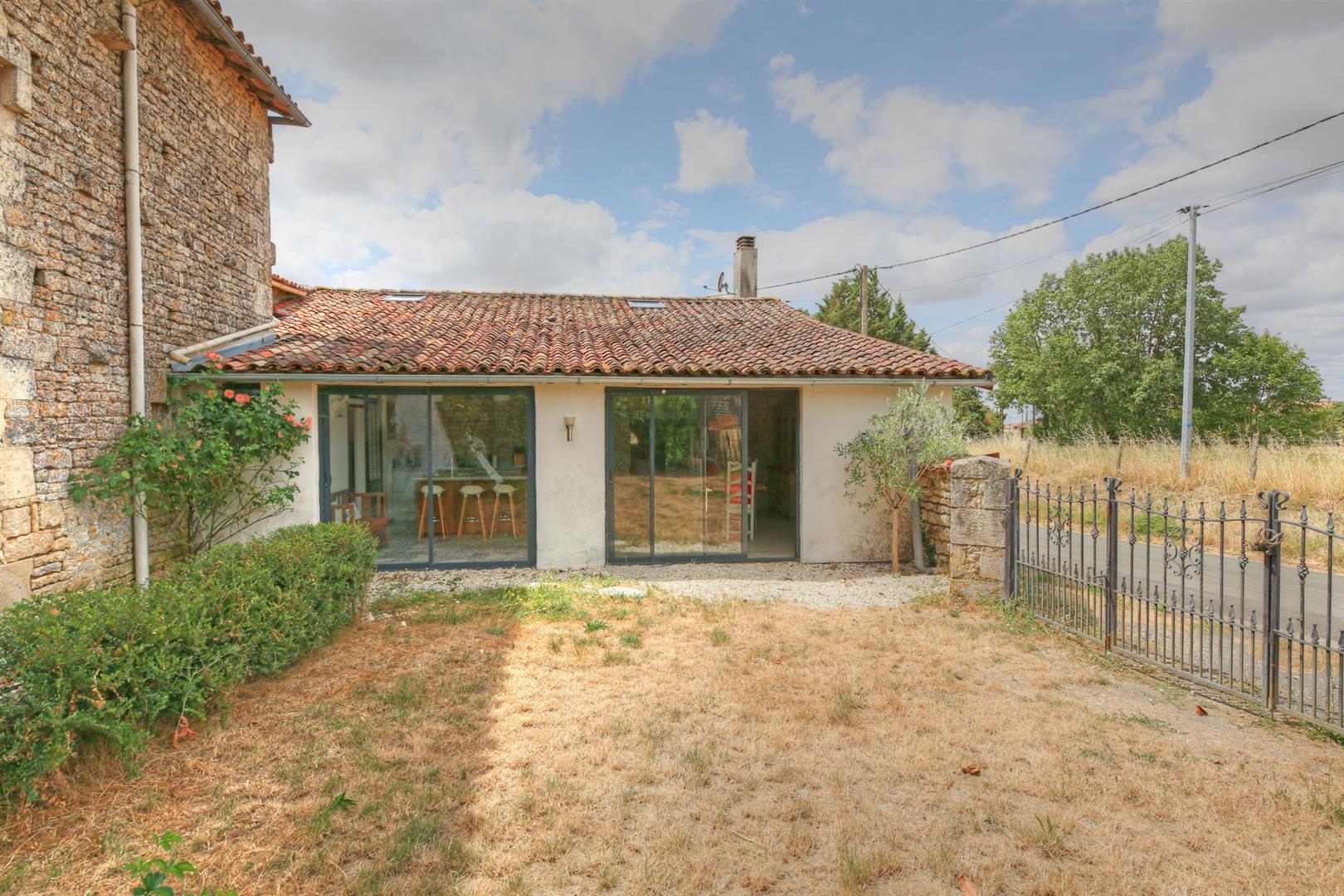Farmhouse and cottage each with 3 beds/2baths, heated pool and large garden.