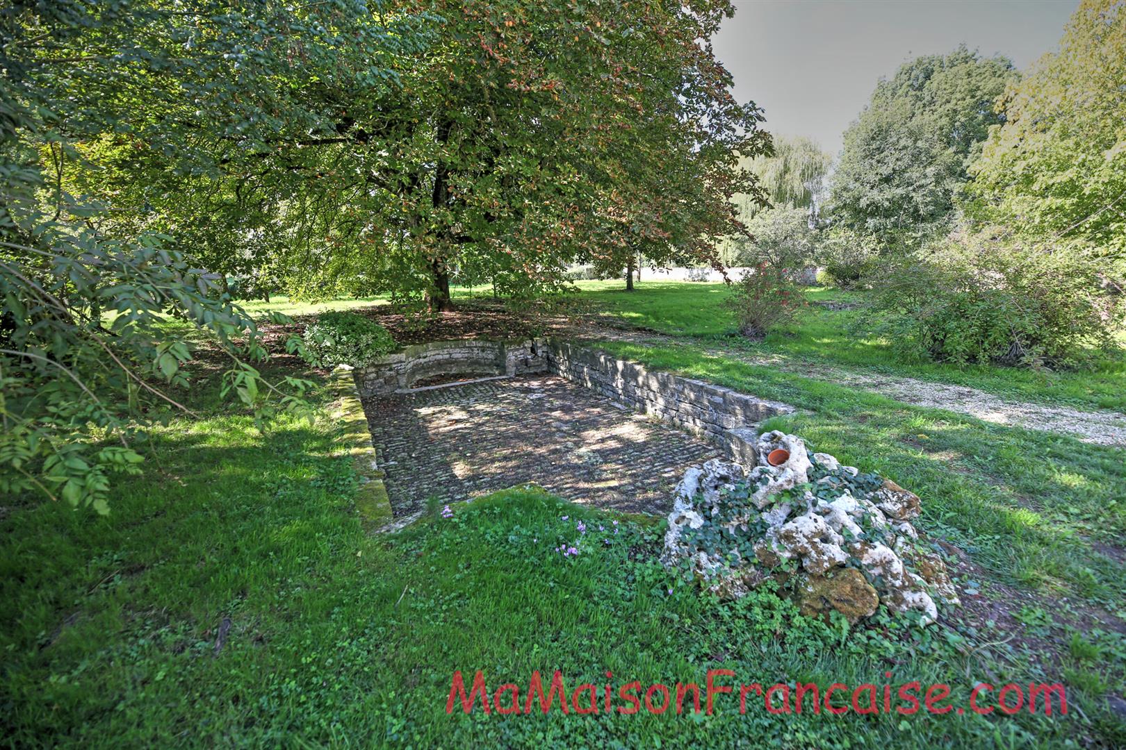 Magnificent Maison de Maître in a town offering spacious, light filled rooms, outbuildings & 5642m2 of land