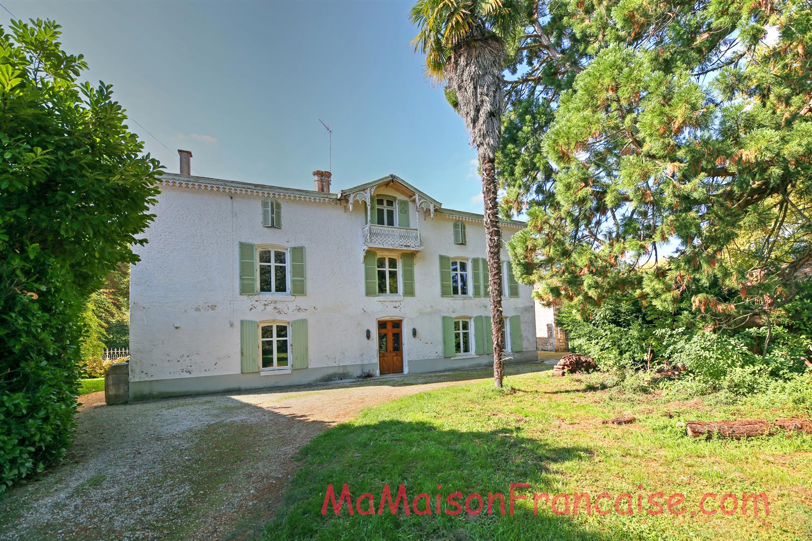 Magnificent Maison de Maître in a town offering spacious, light filled rooms, outbuildings & 5642m2 of land