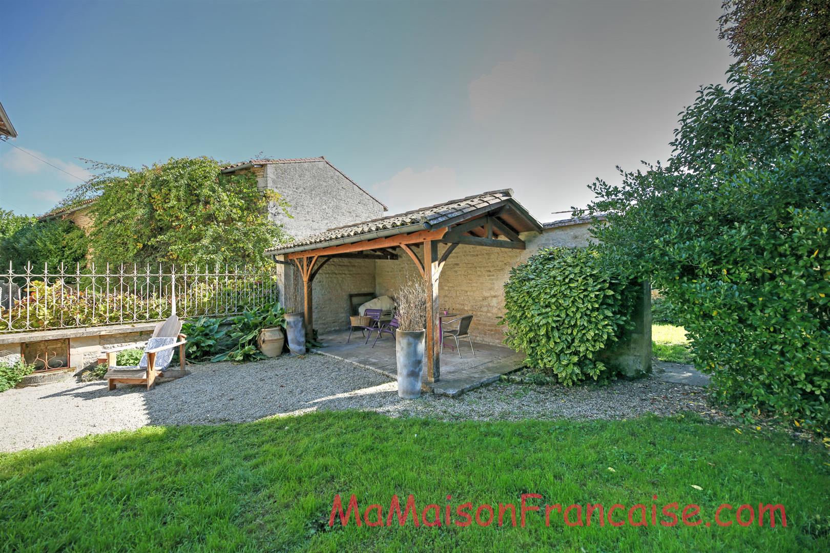 Magnificent Maison de Maître in a town offering spacious, light filled rooms, outbuildings & 5642m2 of land