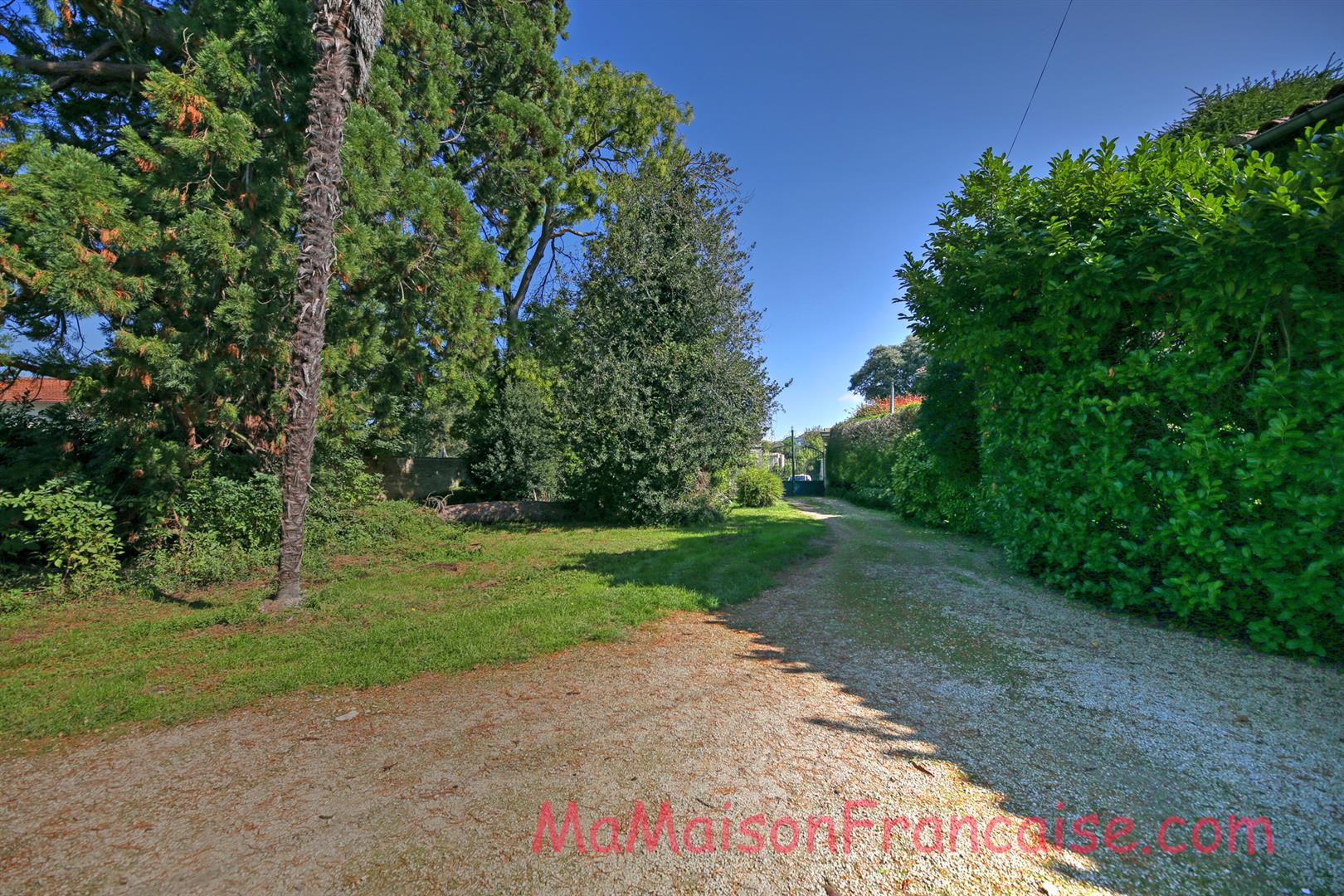 Magnificent Maison de Maître in a town offering spacious, light filled rooms, outbuildings & 5642m2 of land