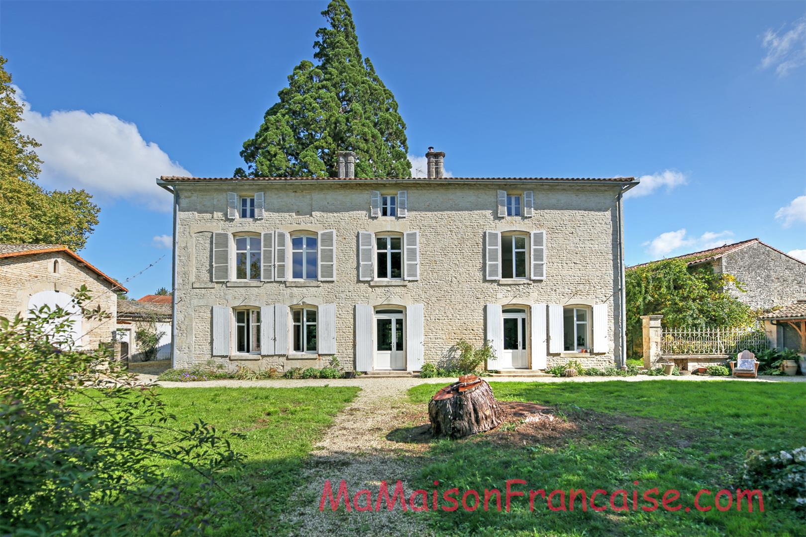 Magnificent Maison de Maître in a town offering spacious, light filled rooms, outbuildings & 5642m2 of land