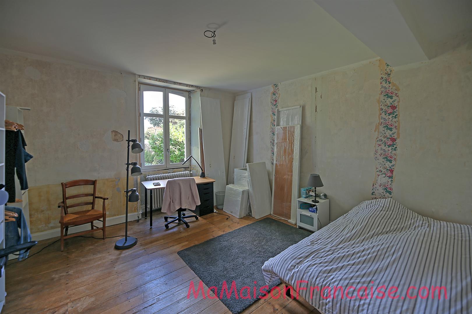 Magnificent Maison de Maître in a town offering spacious, light filled rooms, outbuildings & 5642m2 of land