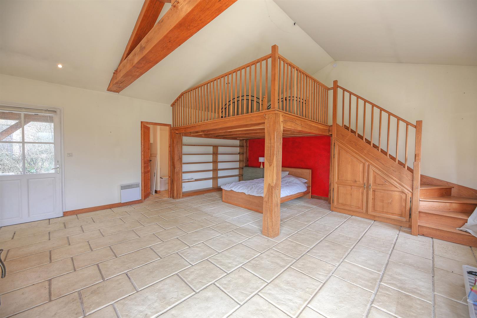 Spacious and light filled barn conversion with guest cottage and 2 acres of gardens.