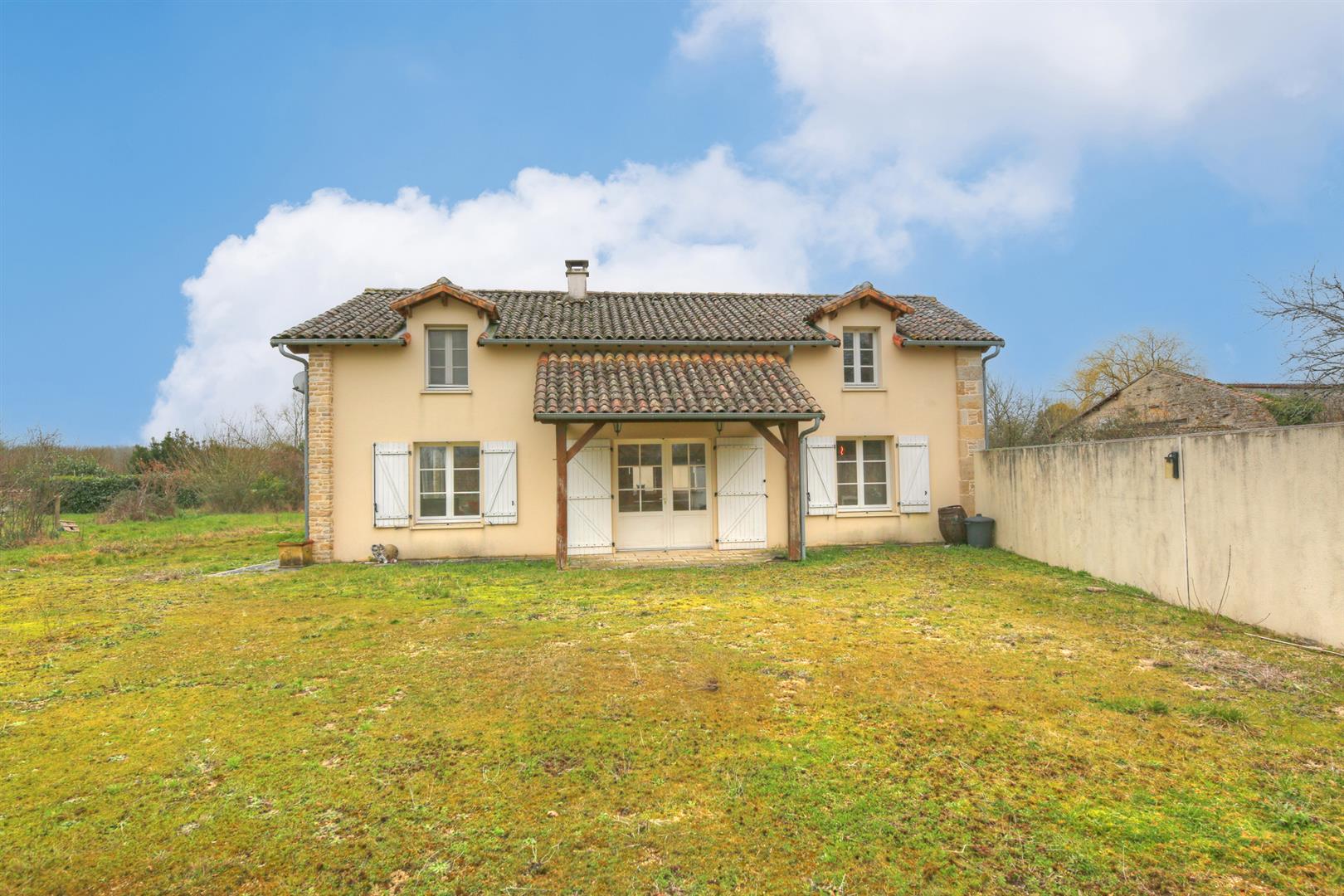Spacious and light filled barn conversion with guest cottage and 2 acres of gardens.