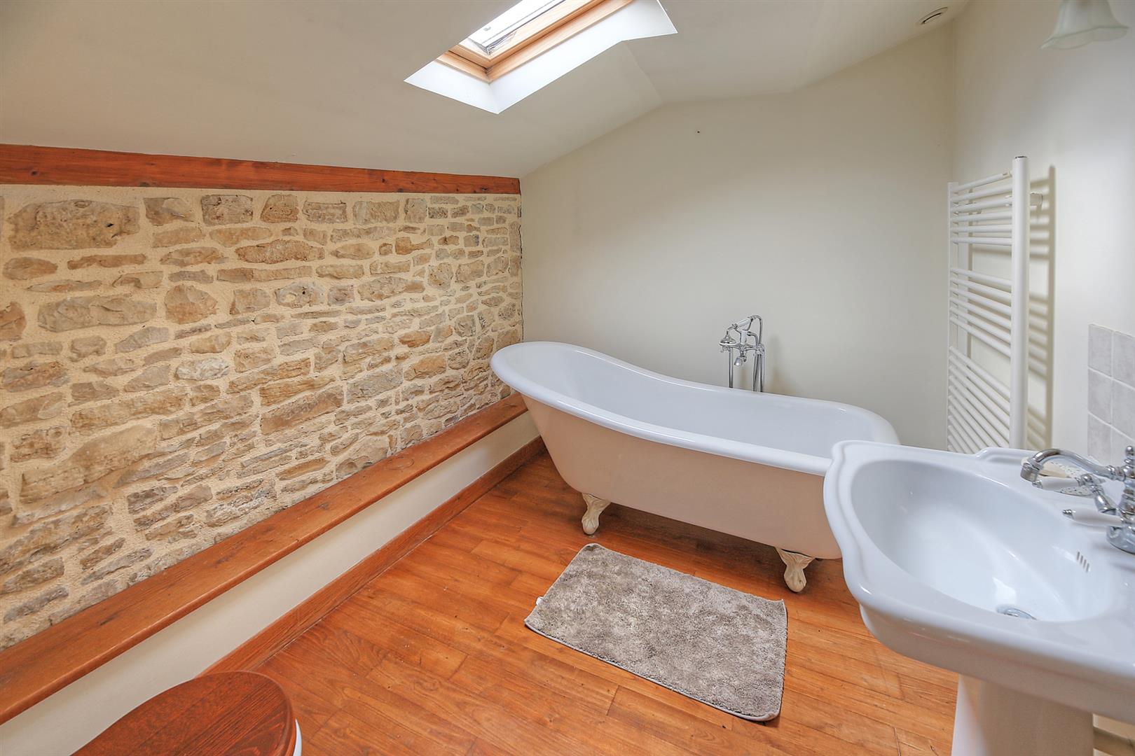 Spacious and light filled barn conversion with guest cottage and 2 acres of gardens.