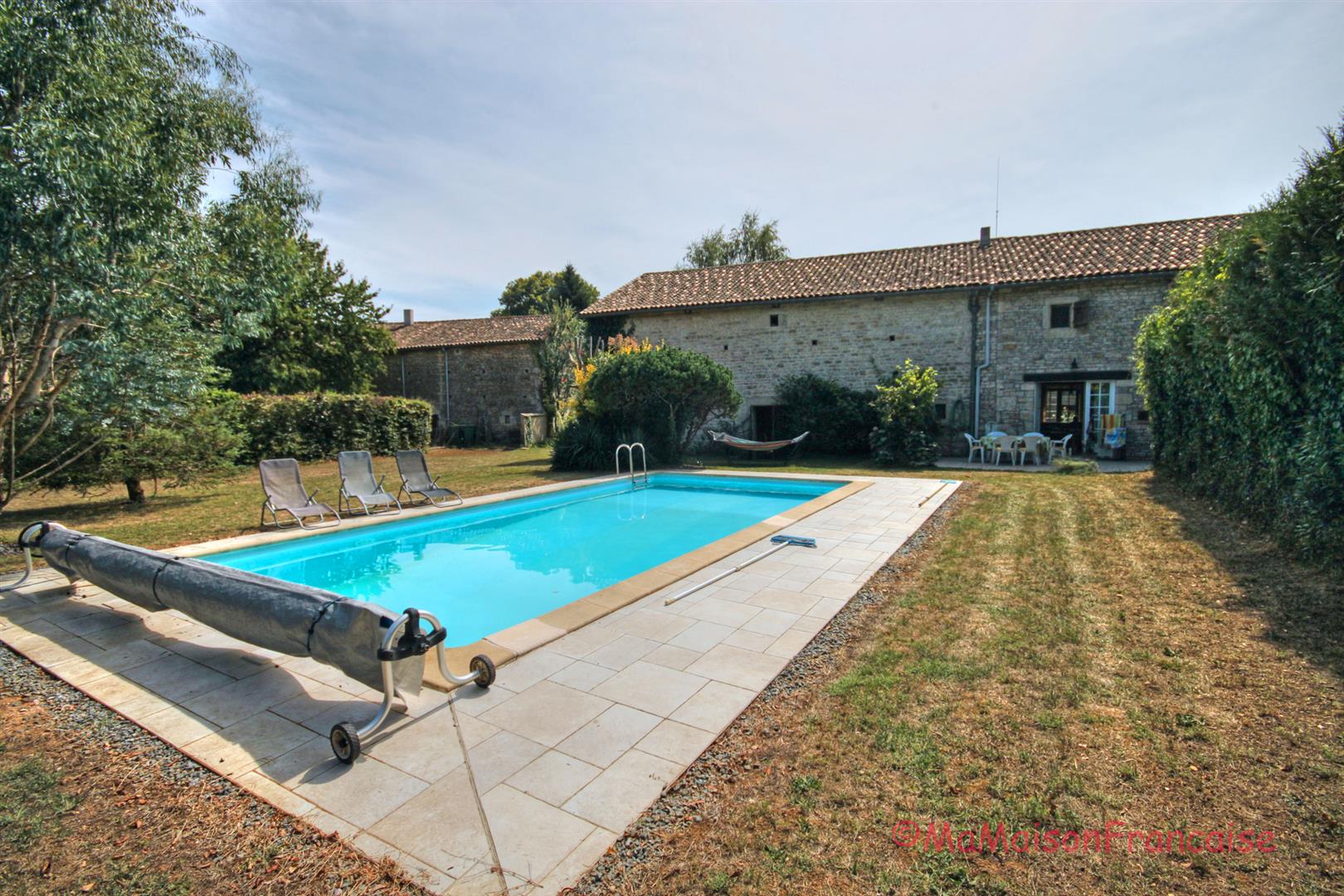 Lovely 4/5 bed stone house with barns and pool in a village with bar