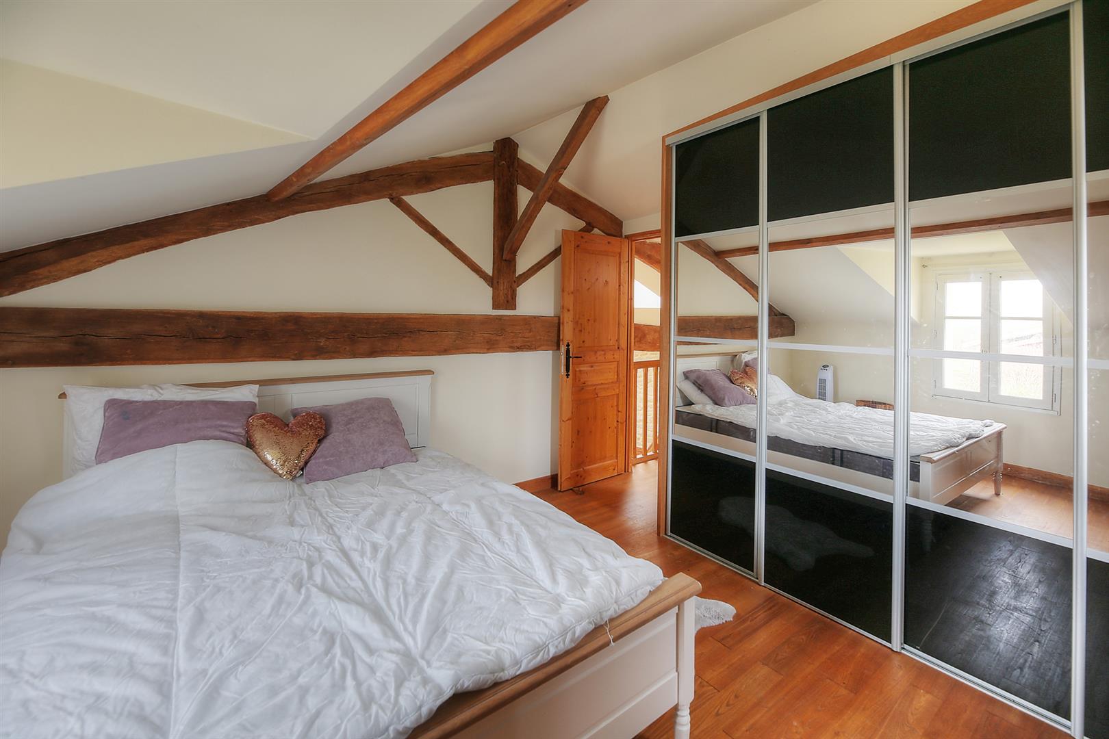 Spacious and light filled barn conversion with guest cottage and 2 acres of gardens.