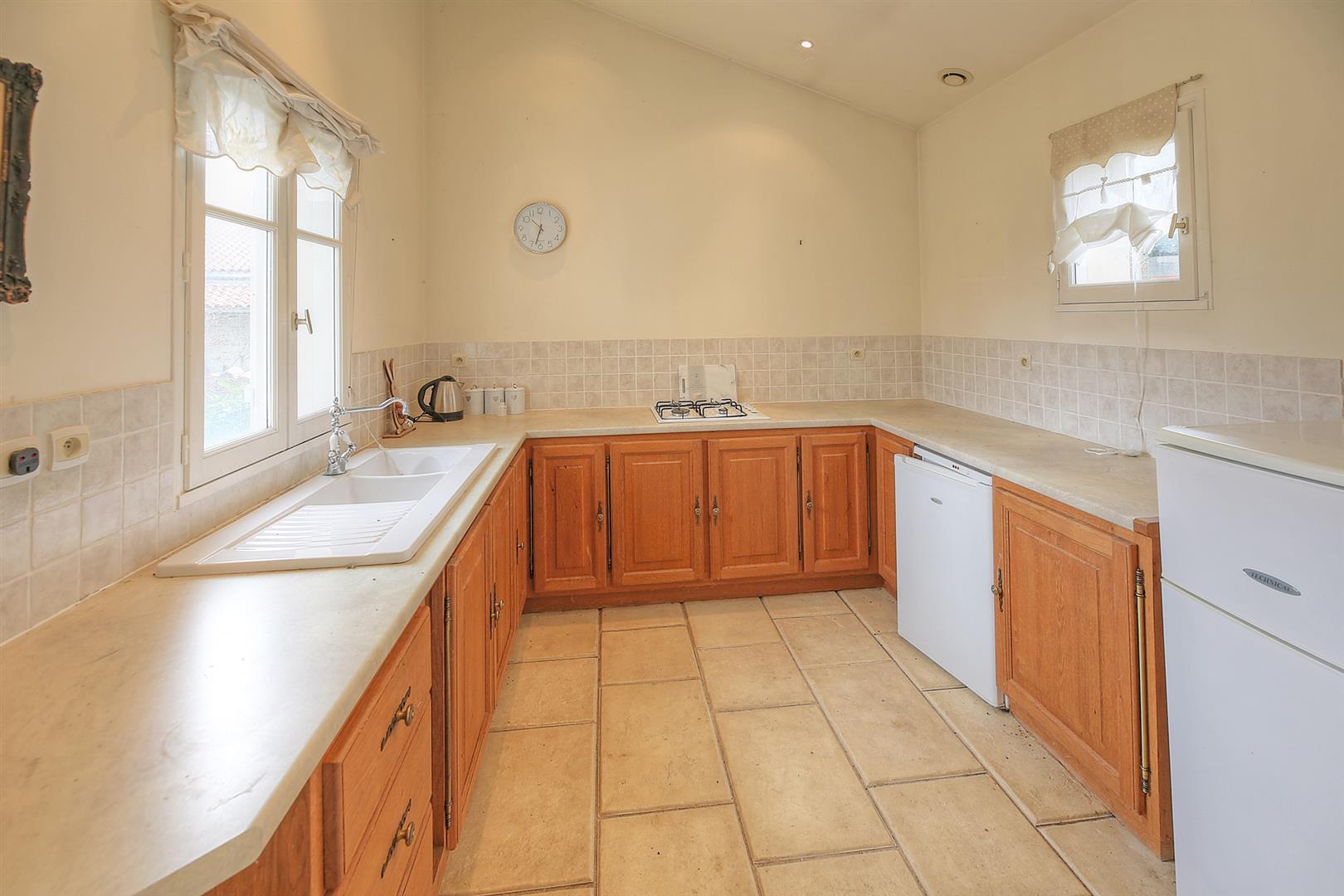 Spacious and light filled barn conversion with guest cottage and 2 acres of gardens.