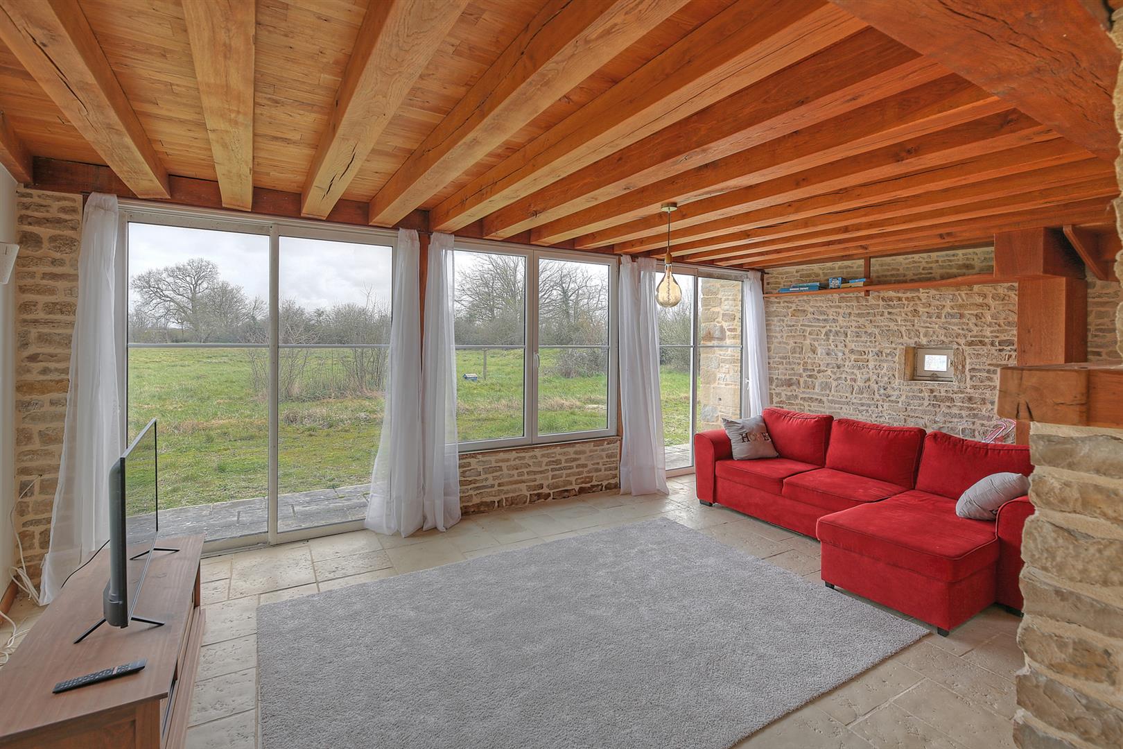 Spacious and light filled barn conversion with guest cottage and 2 acres of gardens.