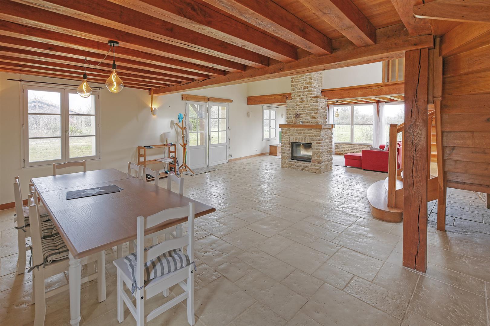 Spacious and light filled barn conversion with guest cottage and 2 acres of gardens.