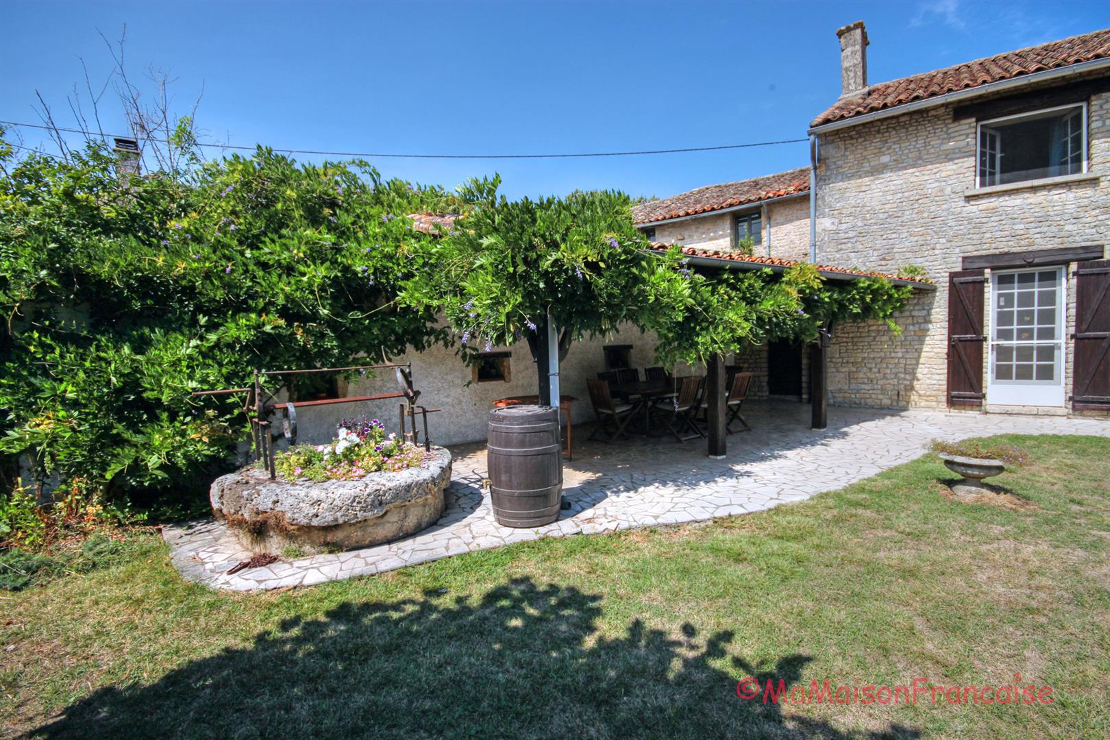 Lovely 4/5 bed stone house with barns and pool in a village with bar