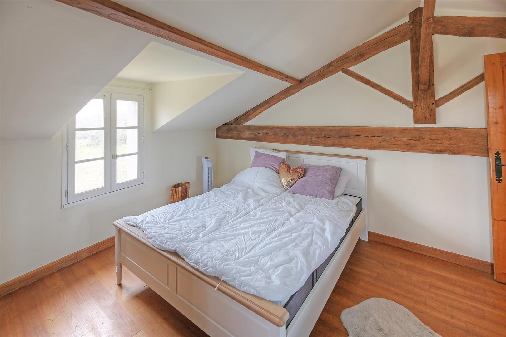 Spacious and light filled barn conversion with guest cottage and 2 acres of gardens.