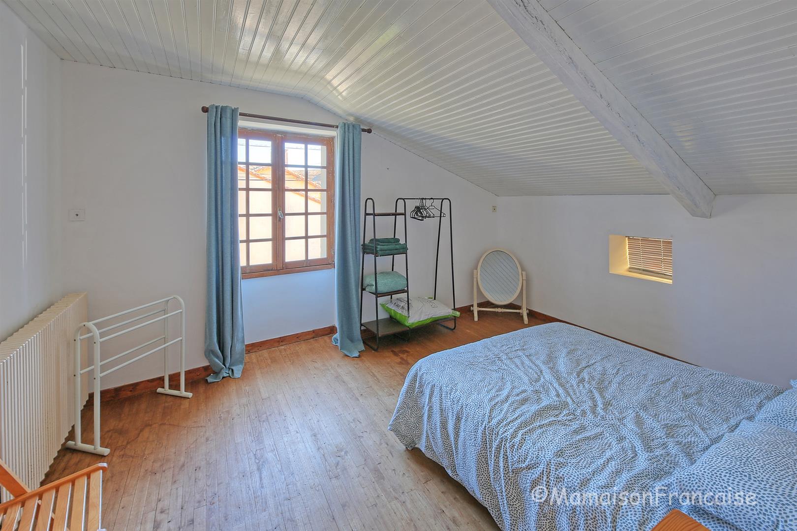 Detached 4 bed/2 bath village house with courtyard, garden & garage.