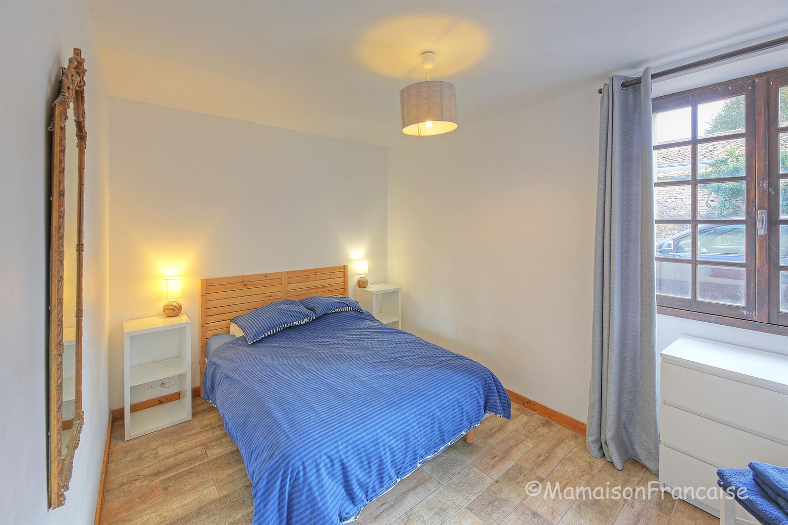 Detached 4 bed/2 bath village house with courtyard, garden & garage.